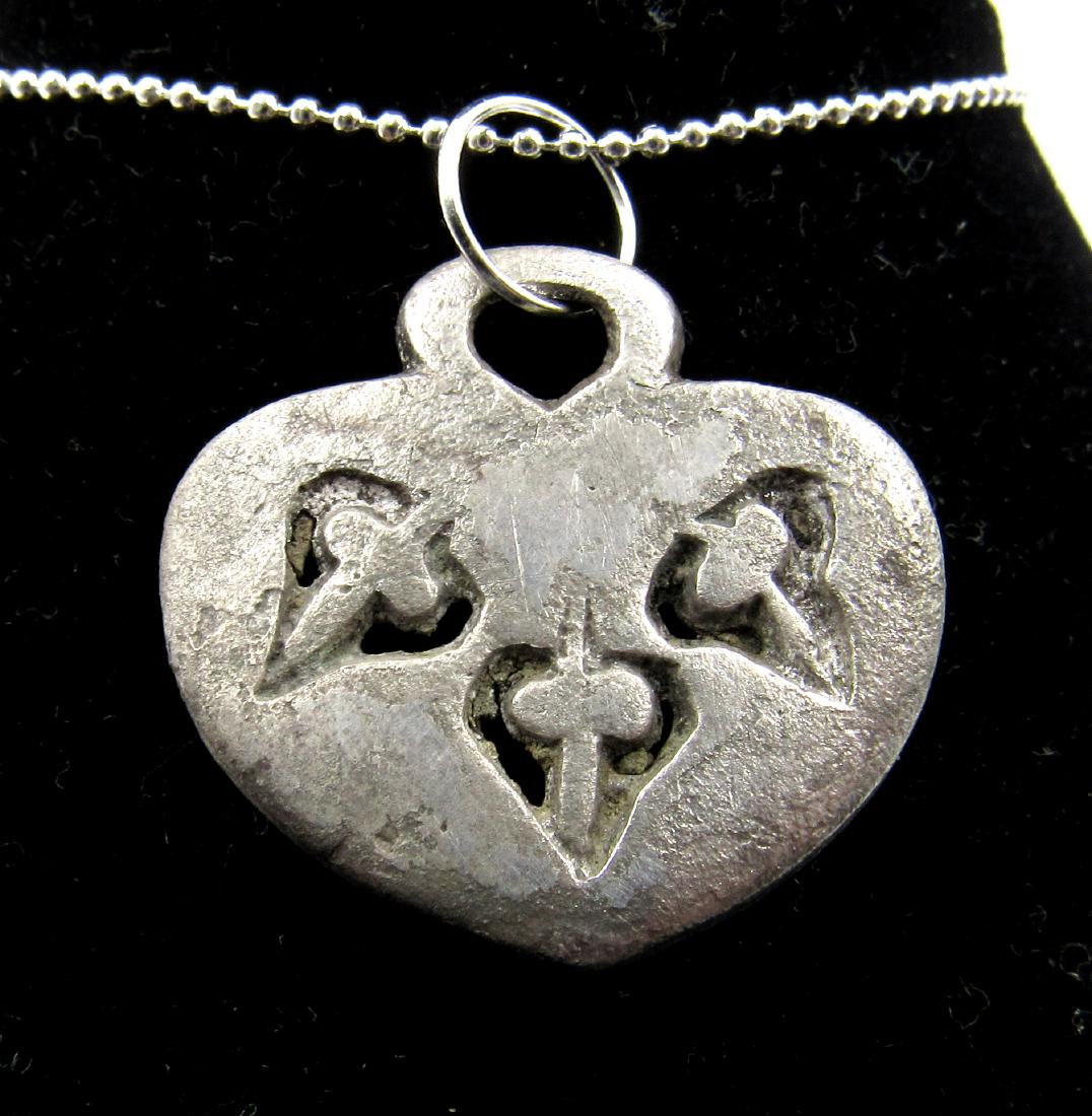 Medieval Viking Era Silver Floral Pendant: Medieval Viking Era Silver Floral Pendant Date: Circa 900 – 1100 AD Medieval Viking Era Silver Floral Pendant. This item has been professionally cleaned to show original details, and includes a life