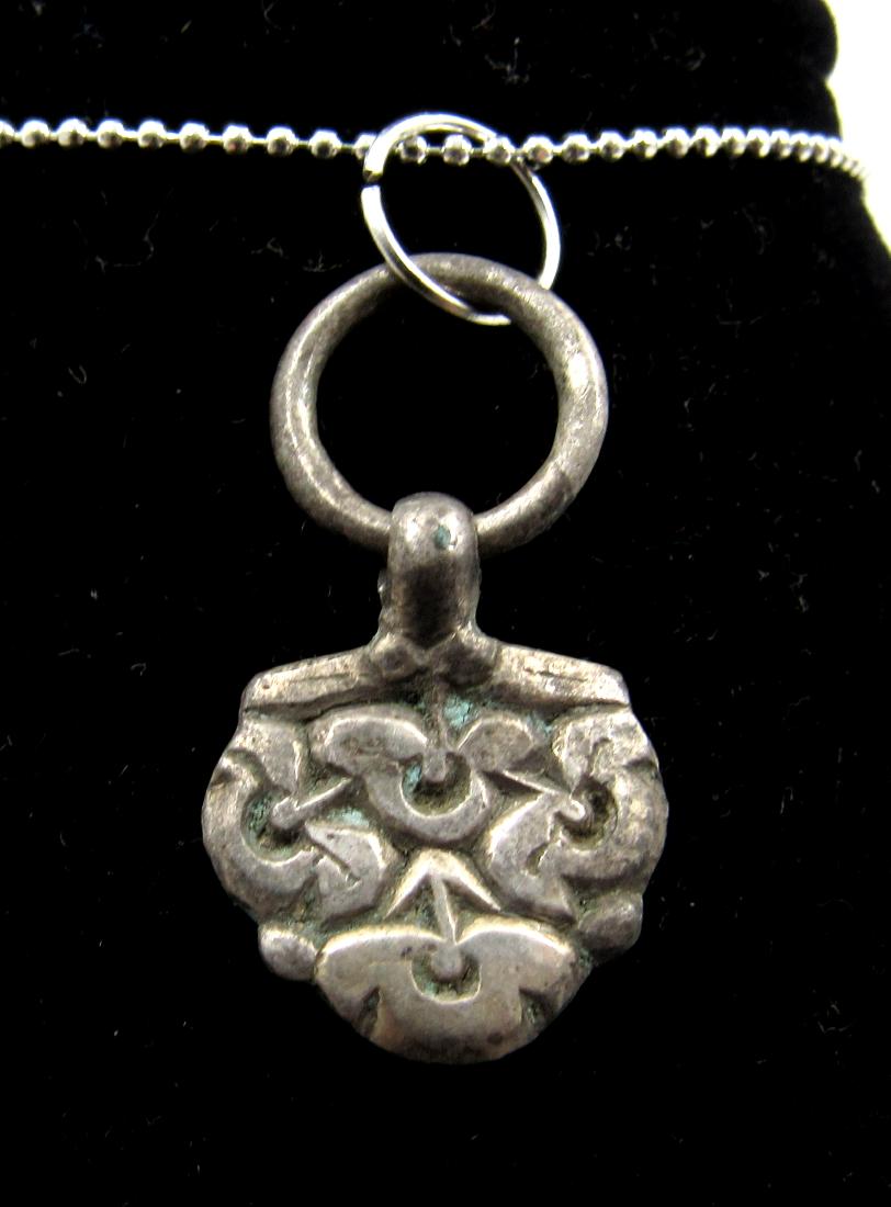 Medieval Viking Era Silver Floral Pendant: Medieval Viking Era Silver Floral Pendant Date: Circa 900 – 1100 AD Medieval Viking Era Silver Floral Pendant. This item has been professionally cleaned to show original details, and includes a life