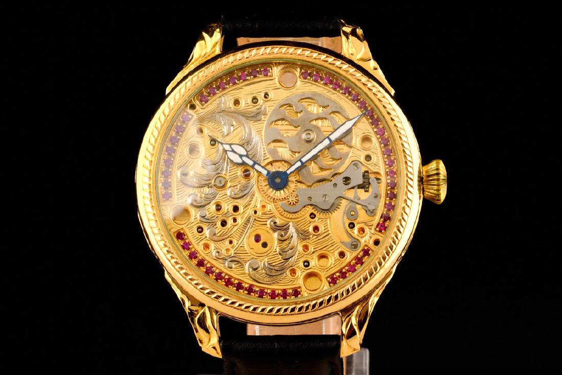 Beautiful Jaeger LeCoultre Skeleton Engraved With Color: Title: Beautiful Jaeger LeCoultre Skeleton Engraved With Color Stones Metal Purity: golden Case Size: 51mm Bracelet Length: 22mm Movement Type: manual Beautiful Jaeger LeCoultre Skeleton Engraved With
