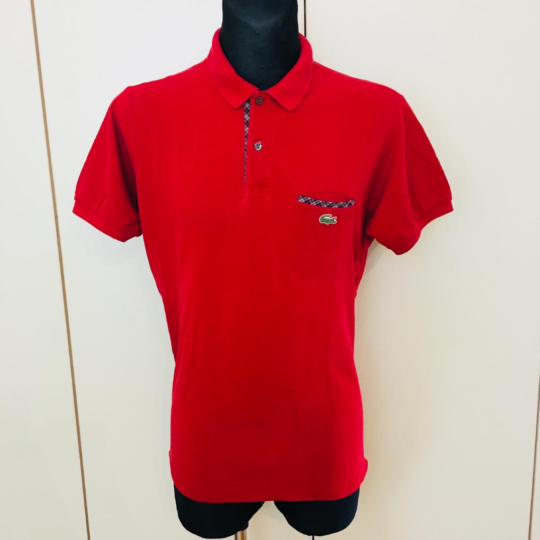 Men's Lacoste Red Polo Shirt Size 5 / L: Men's Lacoste Red Polo Shirt Size 5 / L Modern Cotton 5 / L Armpit to Armpit: 22 in. Shoulder to shoulder: 17 in. Please note that this lot has a confidential reserve. When you leave a bid in advance
