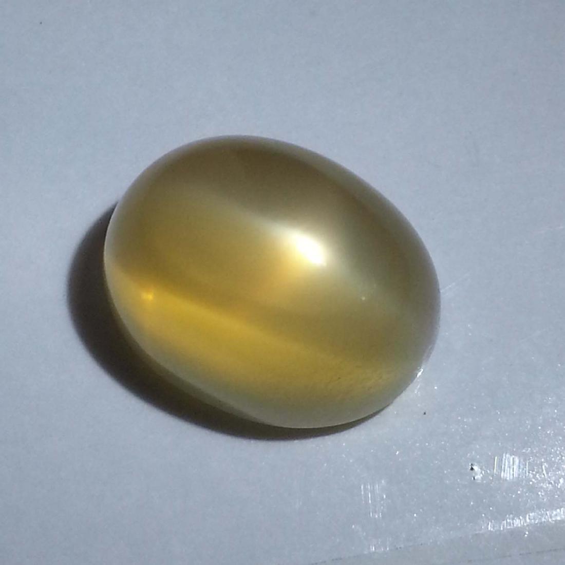 Orange Moonstone - 12.19 ct: Item: Orange Moonstone - 12.19 ct Loose gemstone Color/Clarity: VVS Carat Weight: 12.19 Size (mm)14.80 x 11.25 x 9.65 Oval - India No Reserve: This lot starts at $1 and has no reserve as a courtesy so