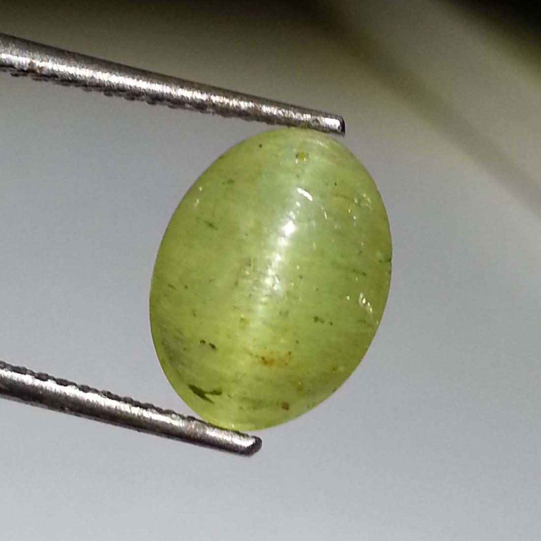 Excellent Apatite cat's Eye - 4.06 ct: Item: Excellent Apatite cat's Eye - 4.06 ct Loose gemstone Color/Clarity: Semi -Transparent Carat Weight: 4.06 Size (mm)10.85 x 8.28 x 5.50 Oval - Jharkhand No Reserve: This lot starts at $1 and has n