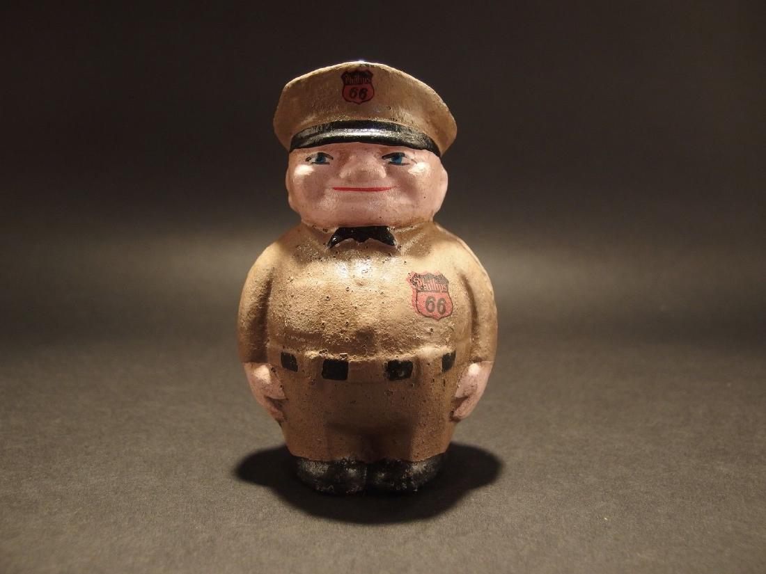 Cast Iron Phillips Route 66 Gas Pump Attendant Coin (1 of 11)