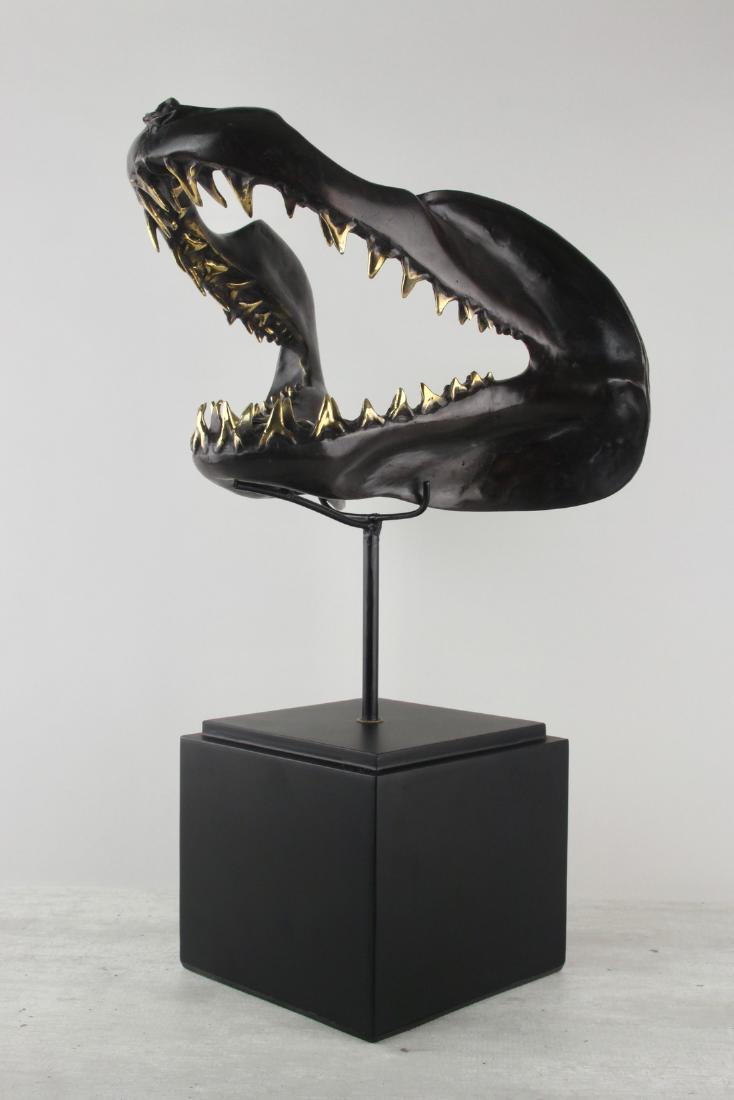 Bronze Shark Jaw with Polished Golden Teeth: Item: Bronze Shark Jaw with Polished Golden Teeth Maker: Design: Jake Richmond Origin: Indonesia Date/Period: 2017 Materials: Bronze Dimensions: Height including stand 55cm / 21.7 inches, width 34cm /