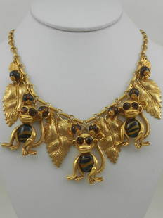 VINTAGE GOLD WHIMSICAL MONKEY NECKLACE COSTUME DESIGNER: FOR YOUR CONSIDERATION: ASKEW LONDON SIGNED CHEEKY WHIMSICAL MONKEY DROP NECKLACE. ANTIQUED GOLD PLATED CAST MONKEYS WITH LARGE FACETED BROWN GLASS STONES AND TORTOISESHELL GLASS CABOCHON OVAL BODIES