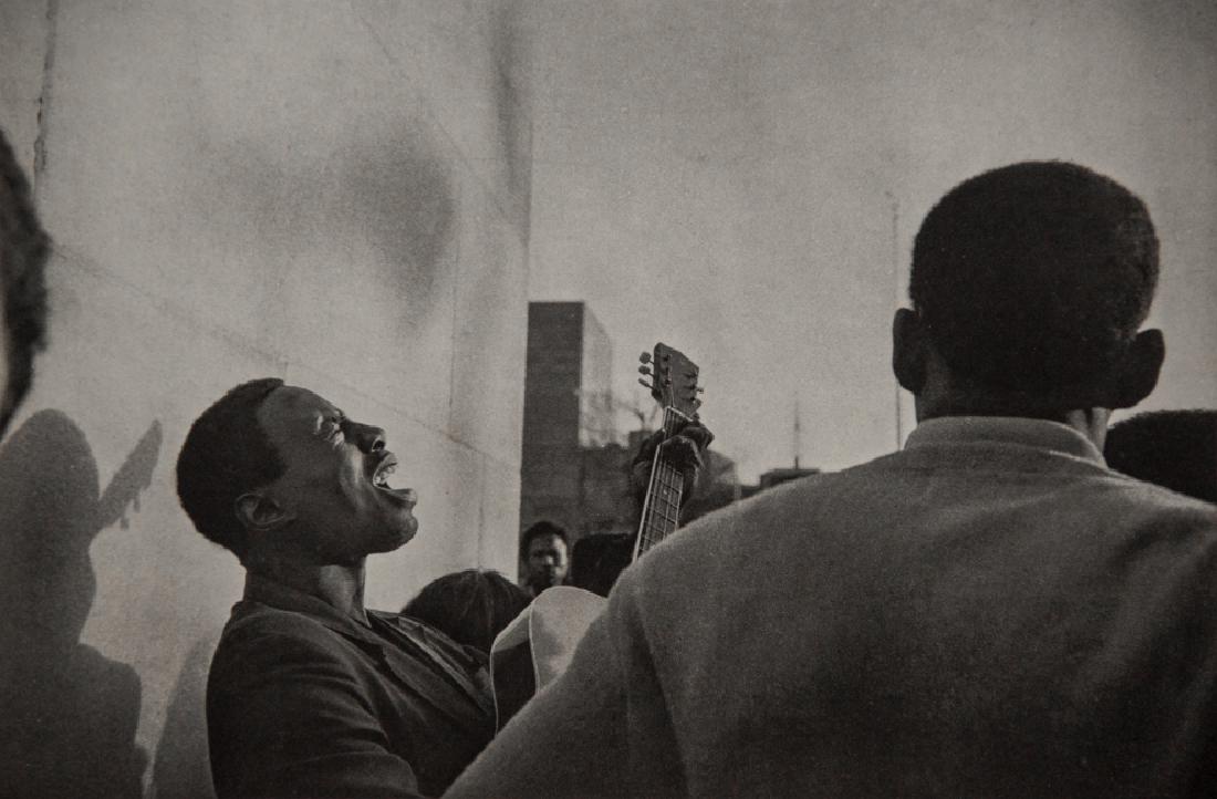 ANDRE KERTESZ - Street Singer, New York, 1969: Artist: Andre Kertesz Title: Street Singer, New York, 1969 Medium: Sheet Fed Gravure, 1972, France Dimensions: 9.5x6.25" Heat Wax Mounted on 11x14" Conservation Board Andre Kertesz, born Kertesz Andor