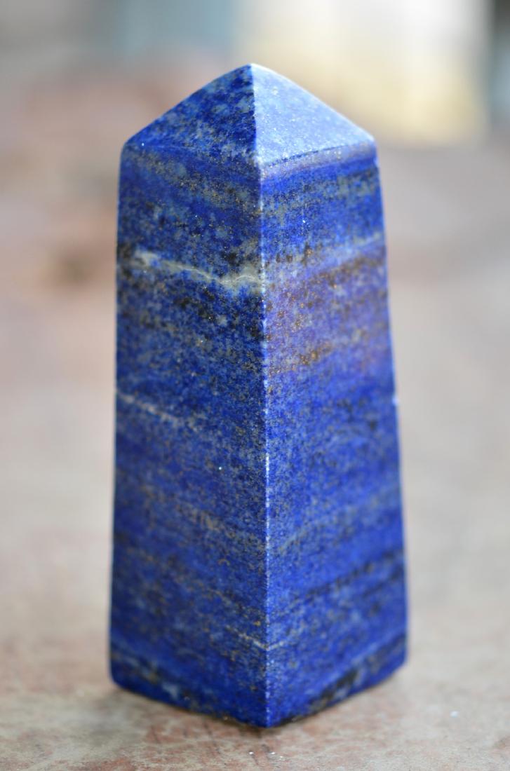 Top Quality Lapis Lazuli Obelisk: Title: Top Quality Lapis Lazuli Obelisk Treatment: Natural Gemstone: Lapis Lazuli Weight: 441 Gram Size/Dimensions: 114x42x40mm Origin: Afghanistan No Reserve: This lot starts at $1 and has no reserve