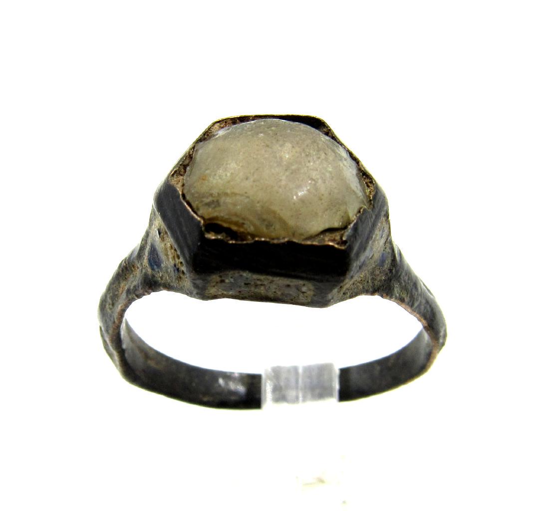 Late Medieval Bronze Ring with Stone & Enamel: Late Medieval Bronze Ring with Stone & Enamel Date: Circa 1600 - 1800 AD Material: bronze, stone, enamel Size: 18mm; 3.2grams Obtained from an old British collection, purchased from a gentleman in Bir