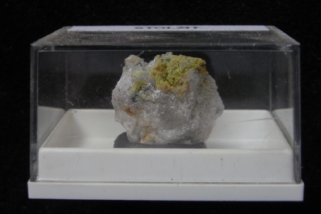 Stolzite: Title: Stolzite Origin: Clara Mine, Oberwolfach, Black Forest, Germany Size: 1.5x1x1 cm yellow stolzite on quartz. Scientific specimen in display box Please note that this lot has a confidential reser