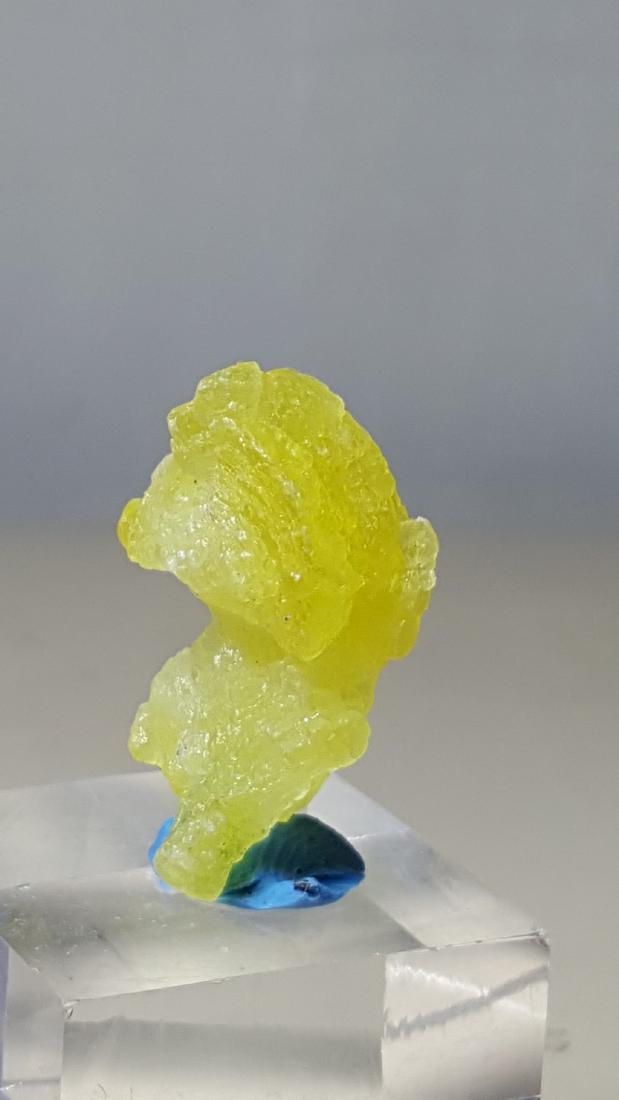 26.5 Carat Rare Mineral Lemon Yellow Brucite From: Title: 26.5 Carat Rare Mineral Lemon Yellow Brucite From Balochistan Origin: AFGHANISTAN Weight: 26.5 CARATS 26.5 Carat Rare Mineral Lemon Yellow Brucite From Balochistan No Reserve: This lot starts a