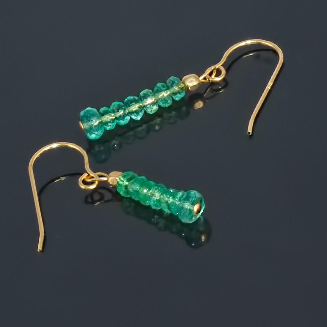14K Earrings with Colombian Emeralds: Item: 14K Earrings with Colombian Emeralds Brand: Regenz Metal Purity: .585 Yellow Gold Gemstones: Colombian Emerald Size/Dimensions: External length (inc. fittings) ~ 1" (2.4 cm) Additional Informati