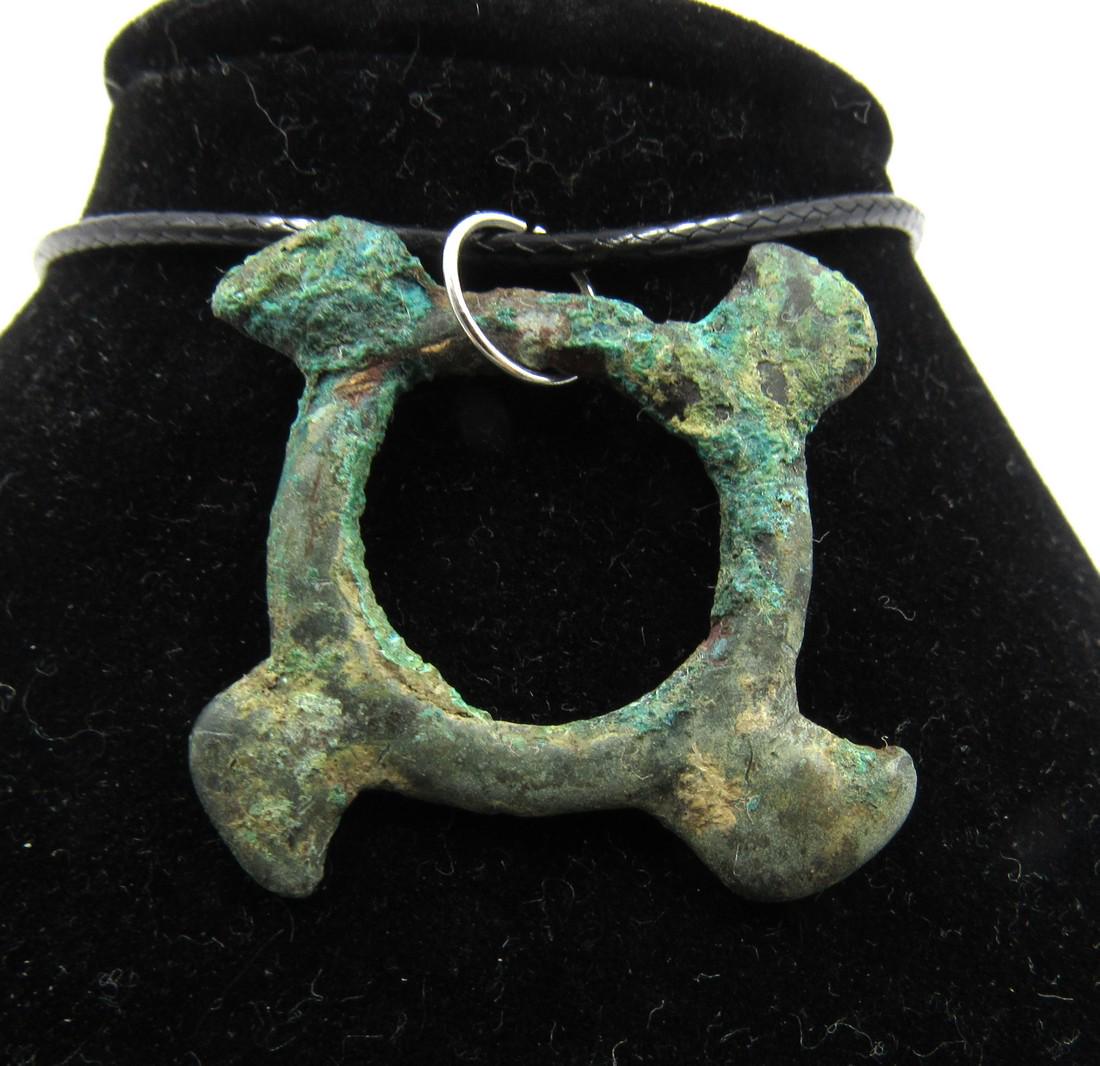 Medieval Viking Era Bronze Eagle Headed Swastika: Medieval Viking Era Bronze Eagle Headed Swastika Pendant Date: Circa 900 – 1100 AD Material: Bronze Provenance: Obtained from an old British collection; Purchased from a private London collector, ac