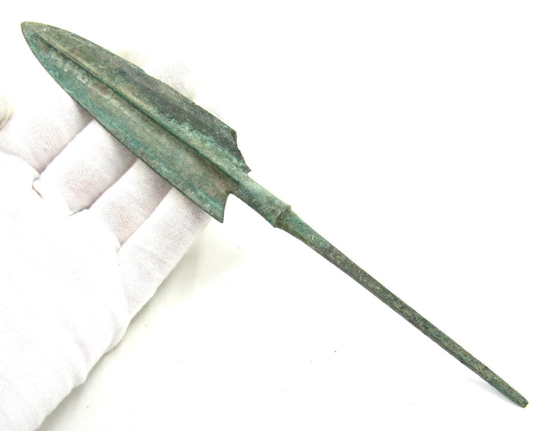 Ancient Greek Bronze Spear Head: Ancient Greek Bronze Spear Head Date: Circa 1600 – 800 BC Material: Bronze Provenance: Obtained from an old British collection, purchased from a gentleman in Birmingham Size: 216mm; 47grams Ancient 