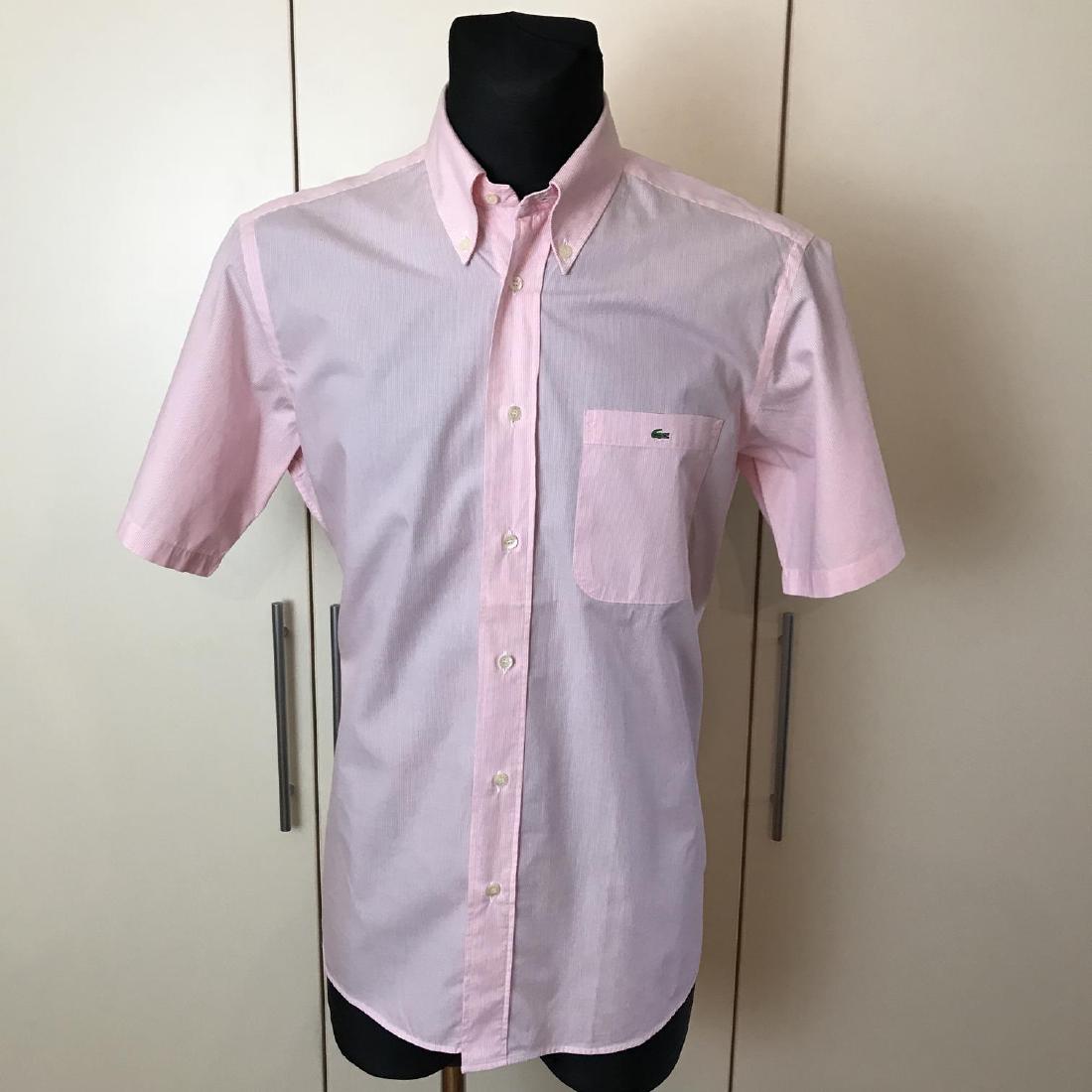 Men's Lacoste Pink Short Sleeve Shirt Top Size US 40: Men's Lacoste Pink Short Sleeve Shirt Top Size US 40 EUR 50 Modern Cotton US 40 EUR 50 Armpit to Armpit: 22.5 in. Please note that this lot has a confidential reserve. When you leave a bid in advance
