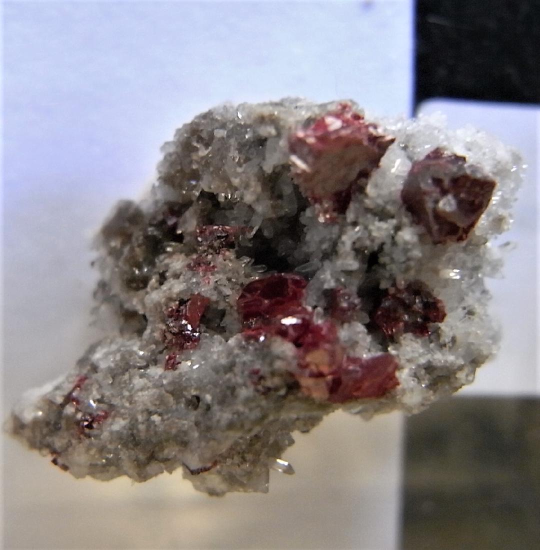 Wine red Cinnabar: Title: Wine red Cinnabar Origin: Scarletti Mine, Pto. De las Senales, Marana, Leon, Spain Size: 1.5x1x0.3 cm wine red crystals of cinnabar on quartz Please note that this lot has a confidential reserv