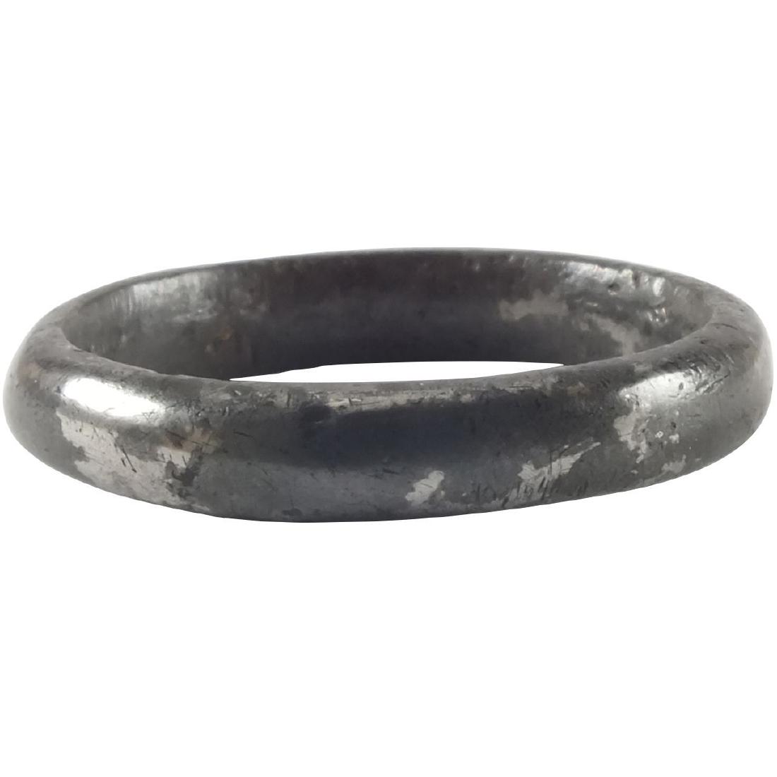 VIKING WOMAN’S WEDDING RING, 866-1067 AD: Silver alloyed bronze, size 5 1/2. Medium width band of high rounded section. Good patina and would have a very silver like polish originally when worn. Vikings exchanged rings on the pommel of the gr
