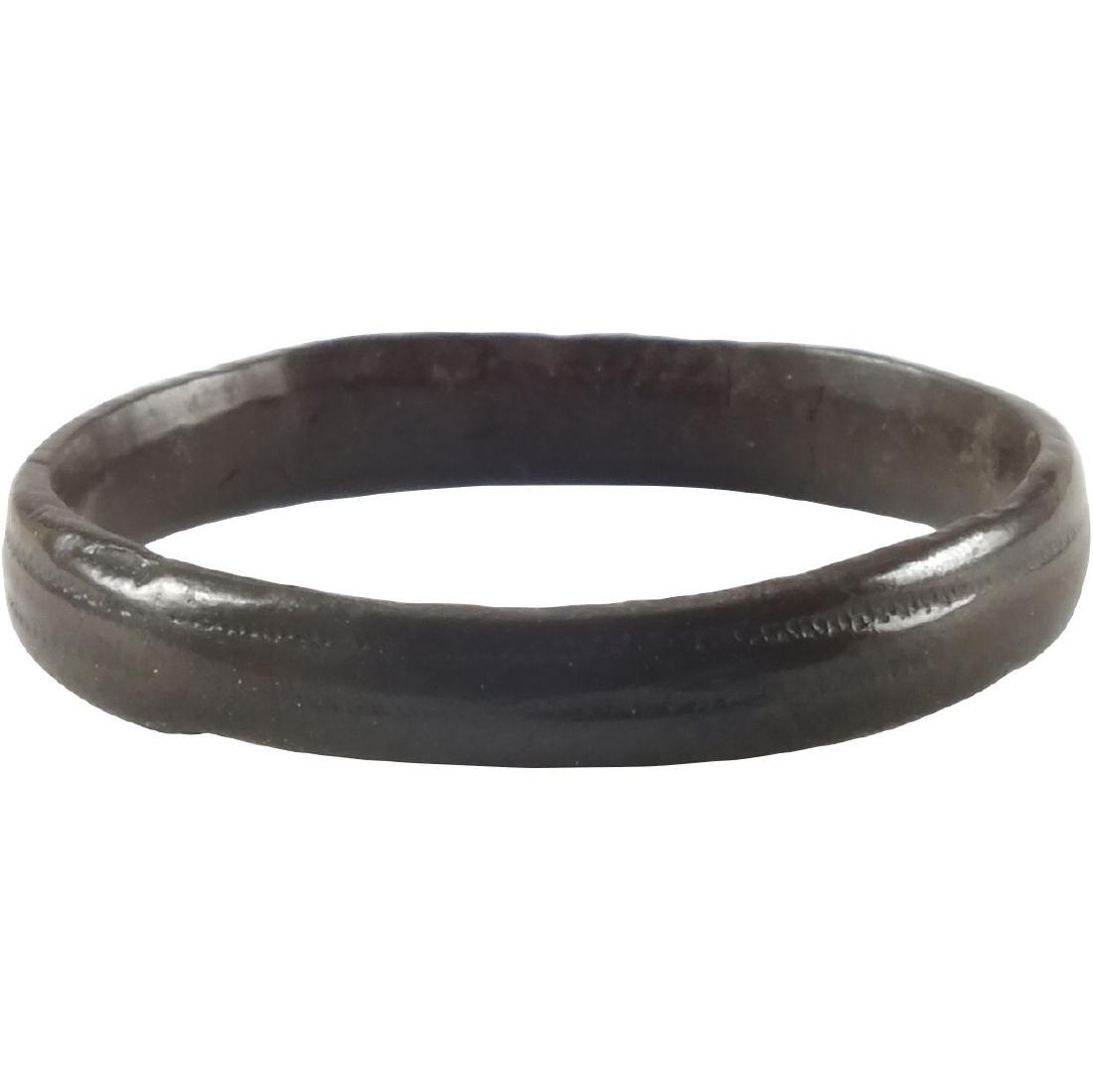 VIKING WEDDING RING, 866-1067 AD: Bronze, originally gilt, size 7. Slightly rounded band with double incised lines. Good patina and preservation. Vikings exchanged rings on the pommel of the groom’s sword. No Reserve: This lot start