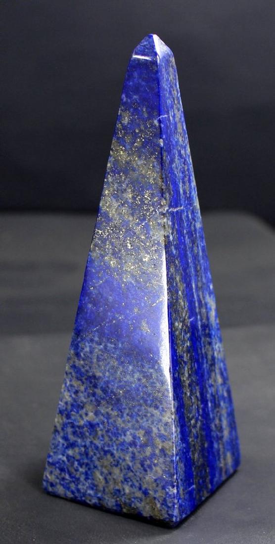 258 Gram Lovely Blue Colo Natural Lapis Lauzli Obelisk: Beautiful Blue color natural Lapis Lazuli Obelisk Weight : 258 Gram Dimensions : 120*39*37mm Origin of Lapis Lauzli : Badakhshan Afghanistan Genuine Blue color Lapis Lazuli Standard DHL shipping; Beau