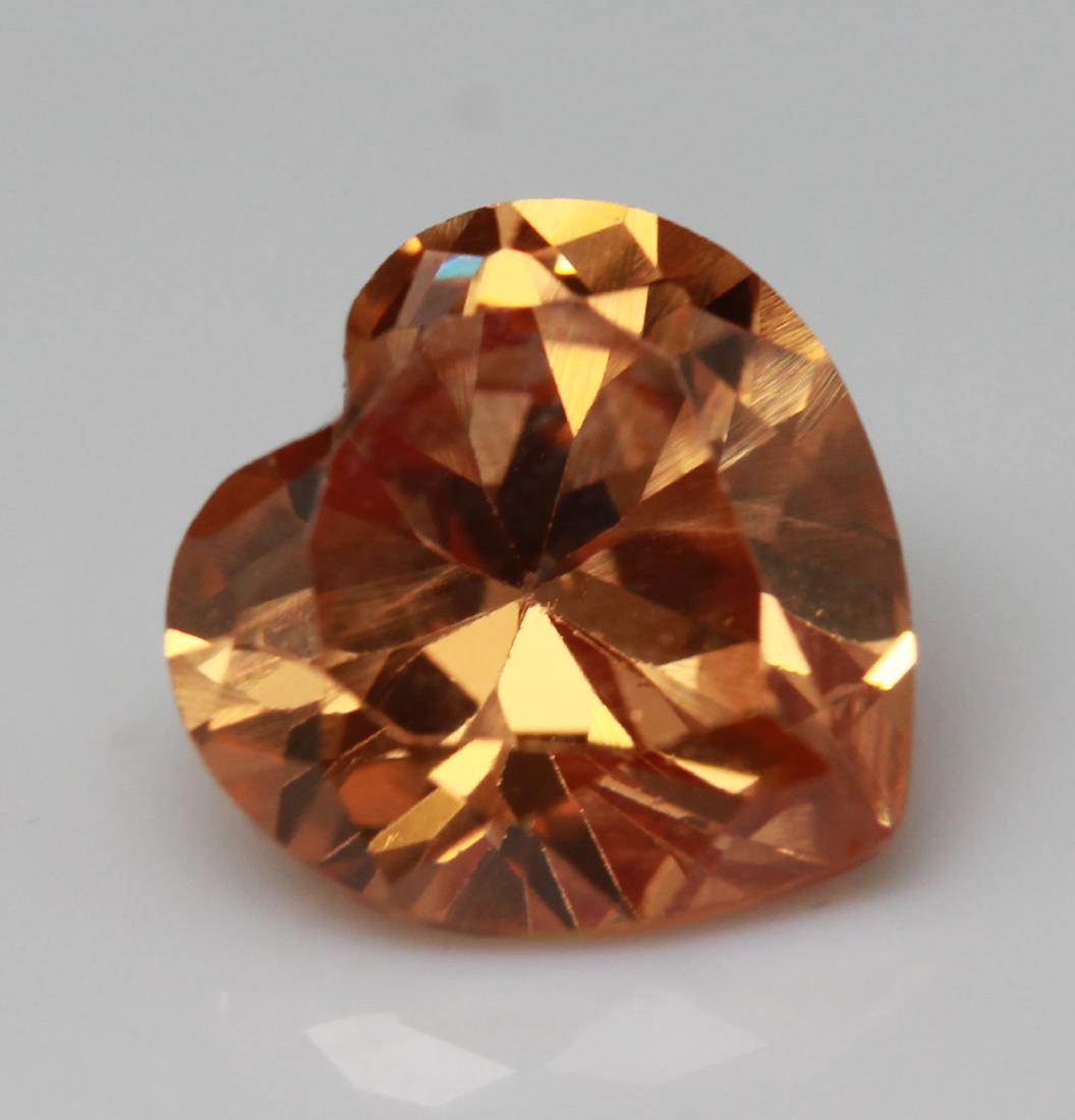 7.20ct. Golden Cambodien Zircon - NO RESERVE: Cambodien Zircon. Carat Weight: 7.20ct. Color: Golden Transparent Shape: Heat Shape Measurements: 9.97 x 9.98 x 6.17 mm. Shipping will be done registered and need to be signed for upon delivery No Res