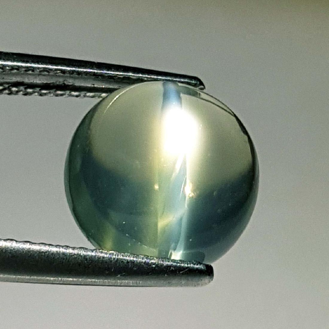 Narutal Moonstone Cat's Eye - 5.98 ct: Item: Narutal Moonstone Cat's Eye - 5.98 ct Color/Clarity: VVS Loose gemstone Carat Weight: 5.98 Size (mm): 11.00 x 10.90 x 7.05 Round - India No Reserve: This lot starts at $1 and has no reserve as a