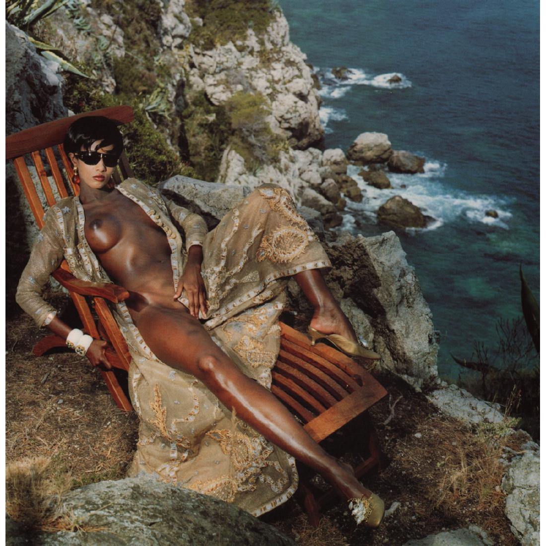 HELMUT NEWTON - Iman, Monte Carlo 1989: Artist: HELMUT NEWTON Print Title: Iman, Monte Carlo 1989 Medium: Color Photo-Lithograph Printing Date: 2000's Printed in Germany Image size approx: 9.5 x 9.5 inches Helmut Newton (1920-2004) was a Ge