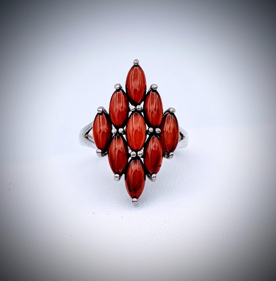 Sterling Silver Diamond Shaped 9 Peace Carnelian Ring: Item: Sterling Silver Diamond Shaped 9 Peace Carnelian Ring Size 7 Brand: Jean Lin Collection Metal Purity: 925 Sterling Silver Gemstones: Carnelian Carat Weights: 9 Marquise Shaped Carnelian at 6.5×