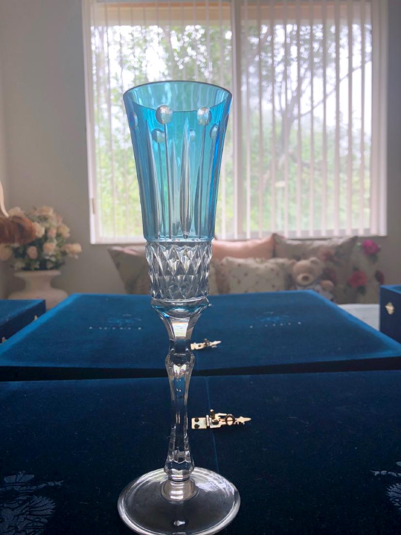 Set of 6 Faberge Xenia BLUE SAPPHIRE champagne wine: Set of 6 Faberge Xenia BLUE SAPPHIRE champagne wine flutes glasses. Cased cut to clear crystal. Genuine 24% lead crystal, signed/etched "Faberge". APPROX. 9" tall, 2 1/4" rim & 2 1/2" base Please note