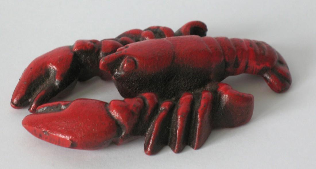 Cast iron lobster.: Nice cast iron lobster paperweight. 1950's 3 1/2" Please note that this lot has a confidential reserve. When you leave a bid in advance of the auction, submit your maximum. The bidder who has submitte