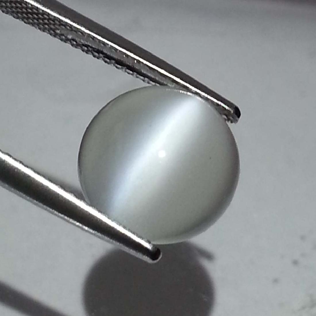 Natural Moonstone Cat's Eye- 4.51 ct: Item: Natural Moonstone Cat's Eye- 4.51 ct Color/Clarity: VVS Loose gemstone Carat Weight: 4.51 Size (mm): 10.50 x 10.50 x 5.80 Round - Srilanka No Reserve: This lot starts at $1 and has no reserve as