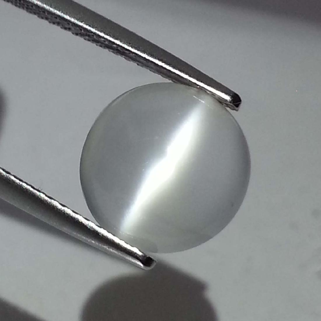 Natural Moonstone Cat's Eye- 4.49 ct: Item: Natural Moonstone Cat's Eye- 4.49 ct Color/Clarity: VVS Loose gemstone Carat Weight: 4.49 Size (mm): 10.20 x 10.10 x 6.20 Round - Srilanka No Reserve: This lot starts at $1 and has no reserve as