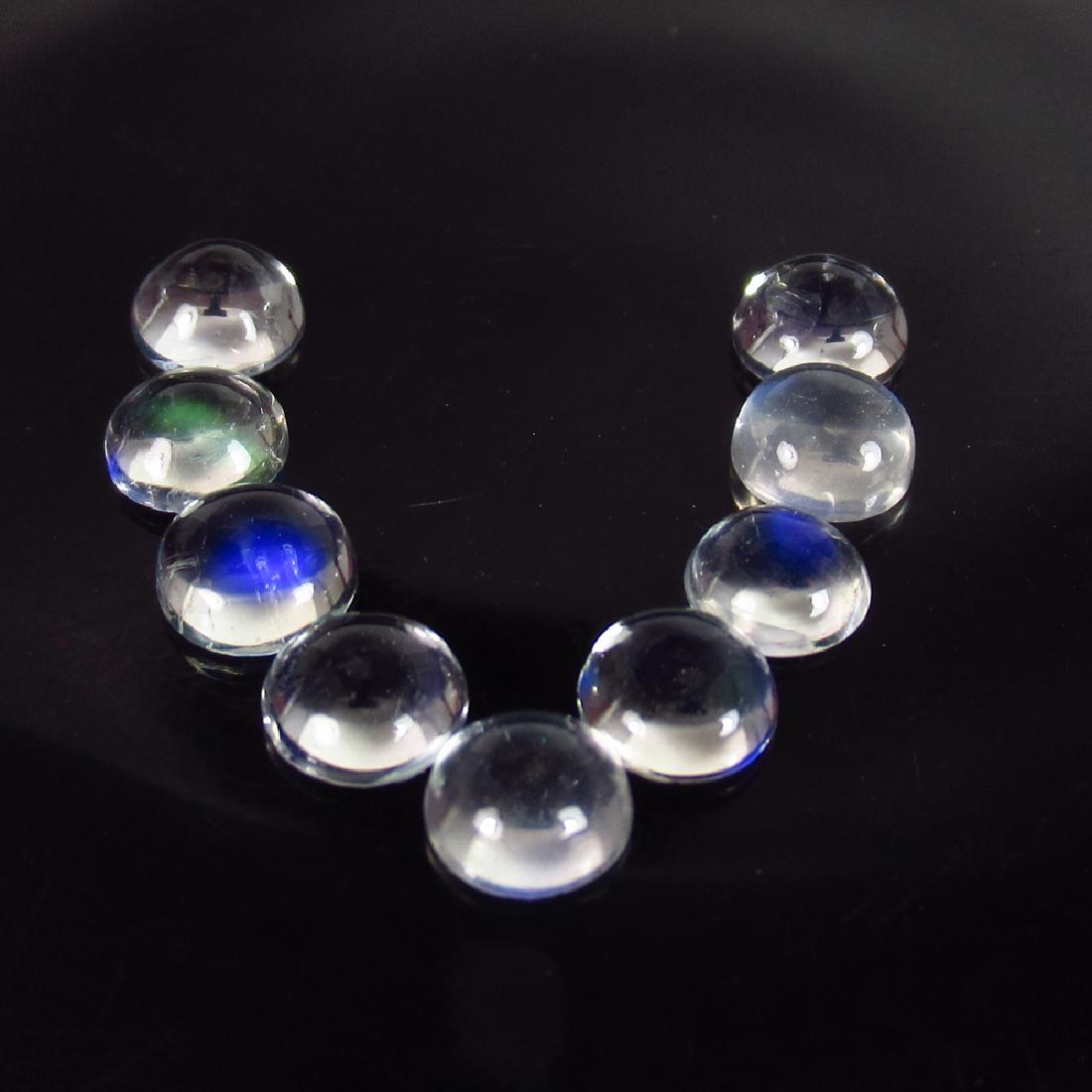 3.85 Ct Genuine 9 Loose Blue Moonstone Calibrate: Item: 3.85 Ct Genuine 9 Loose Blue Moonstone Calibrate Matching Round Necklace Set Stone Clarity: VVS Gemstones: Moonstone Carat Weights: 3.85 Size/Dimensions: Caibrate 5.00 mm Nearly / 9 PC's Additio