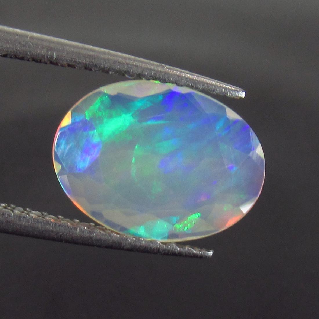 1.19 Ct Genuine Ethiopian Multi-Color Fire Faceted Opal (1 of 2)