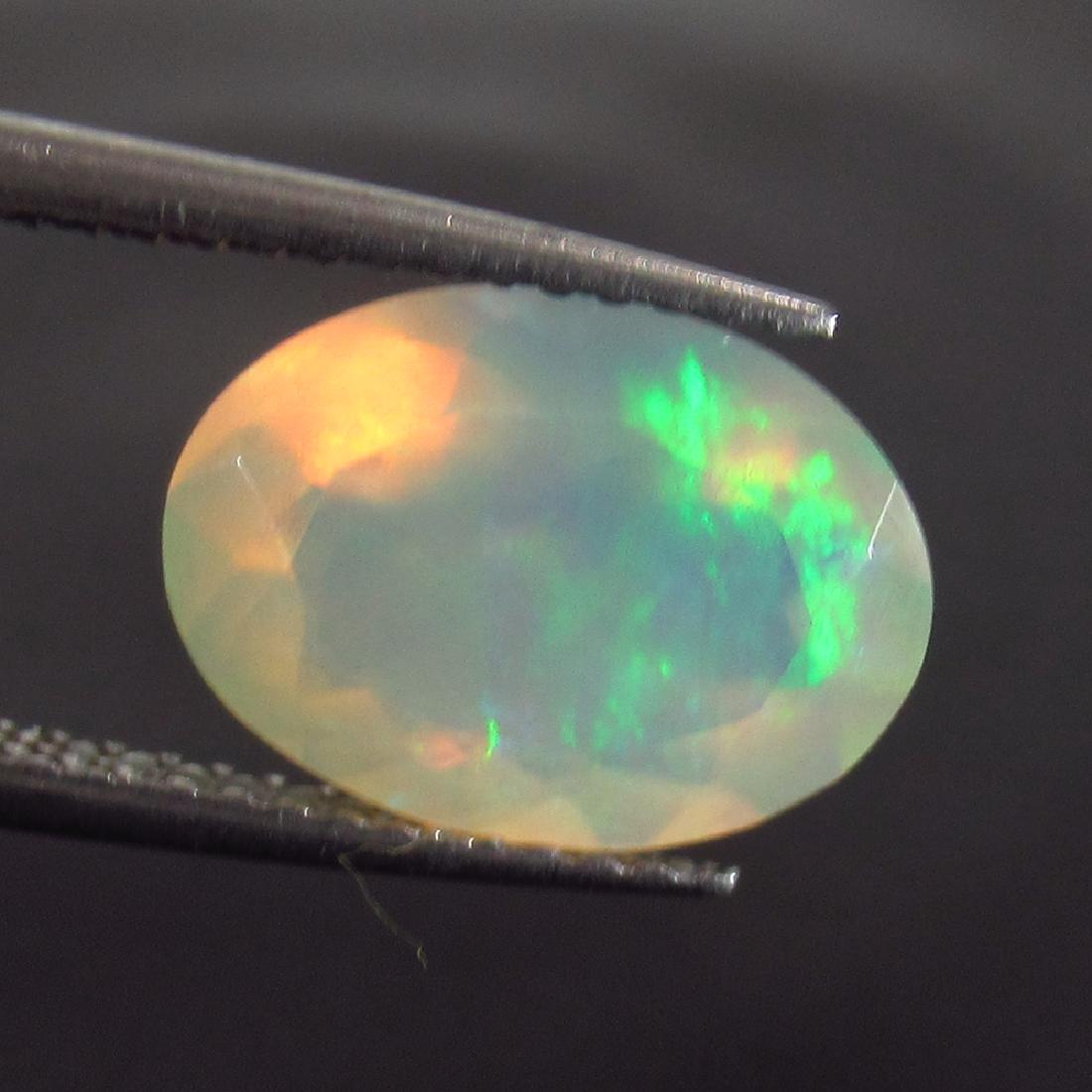 2.01 Ct Genuine Ethiopian Multi-Color Fire Faceted Opal (1 of 2)