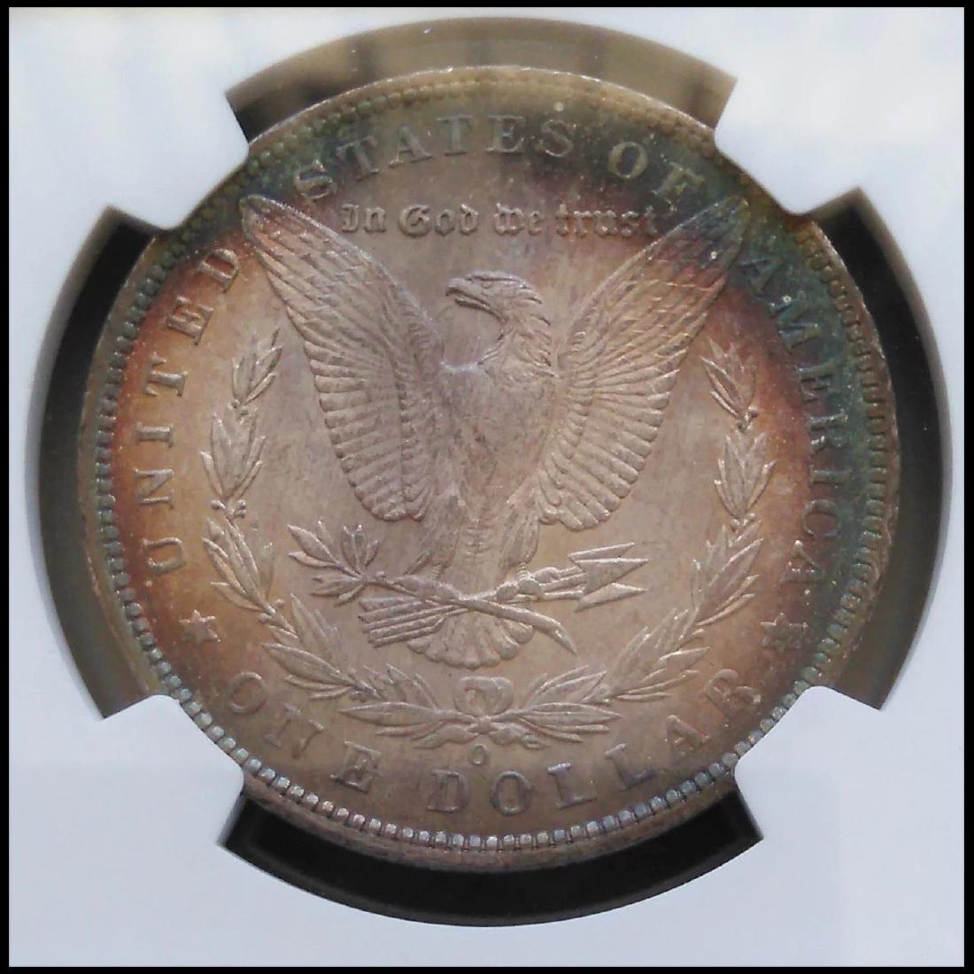 1890-O Morgan Silver Dollar Slabbed NGC Unc Details: 1890-O MORGAN SILVER DOLLAR; This beautiful coin has been graded by one of the top two grading companies in the world NGC; It is graded UNC DETAILS OBV STAINED; Actually it is just toning from a rubbe