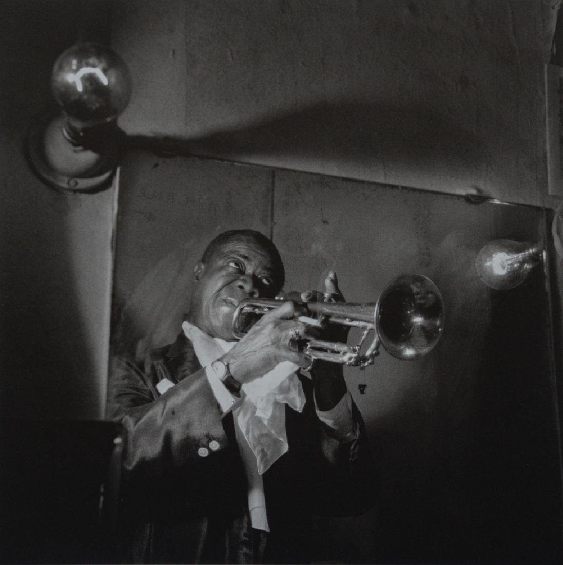 JEANLOUP SIEFF - Louis Armstrong, Paris, 1955: Artist: Sieff, Jeanloup Title: Louis Armstrong, Paris, 1955 Medium: Photo Litho, 1990, France Dimensions: 7.45x.745" Heat Wax Mounted on 11x14" Conservation Board Jeanloup Sieff (1933-2000) was a Fren