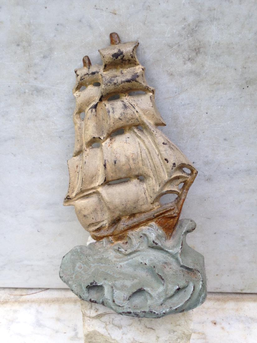 Early 20th Century Cast Iron Clipper Ship Doorstop in: Early 20thc cast iron clipper ship doorstop in original finish 9 1/8" x 5 3/4" Albany foundry Mark Please note that this lot has a confidential reserve. When you leave a bid in advance of the auction,