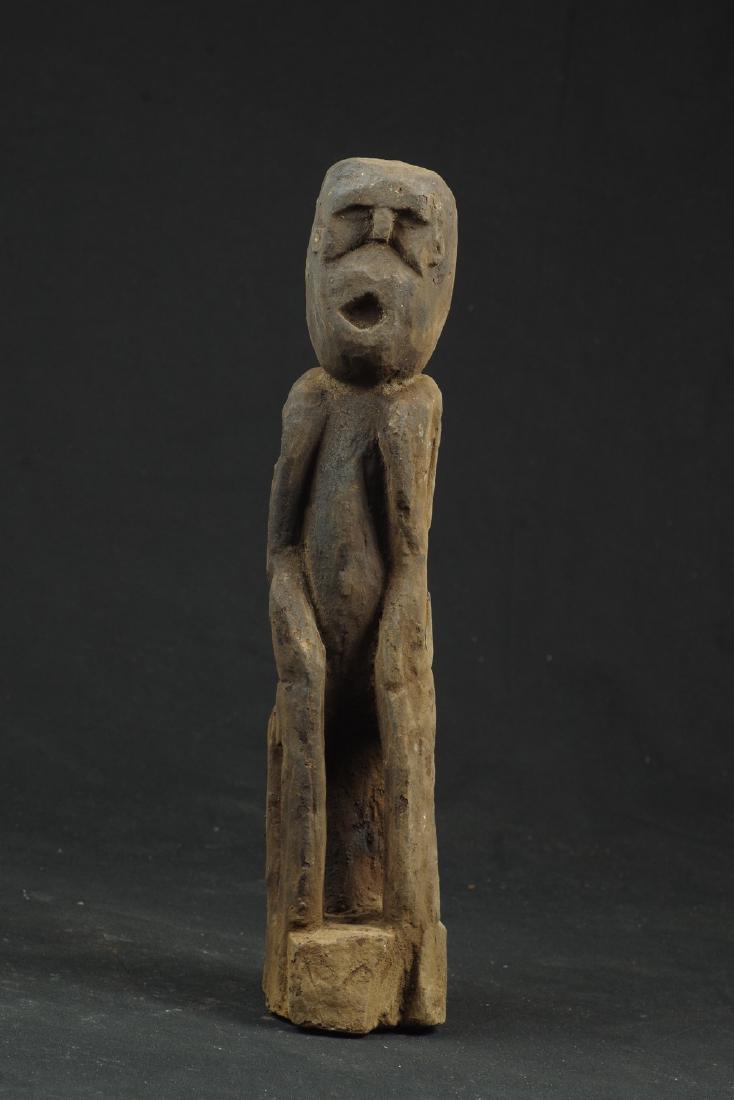 Sitting ancestor figure expressive face (1 of 10)