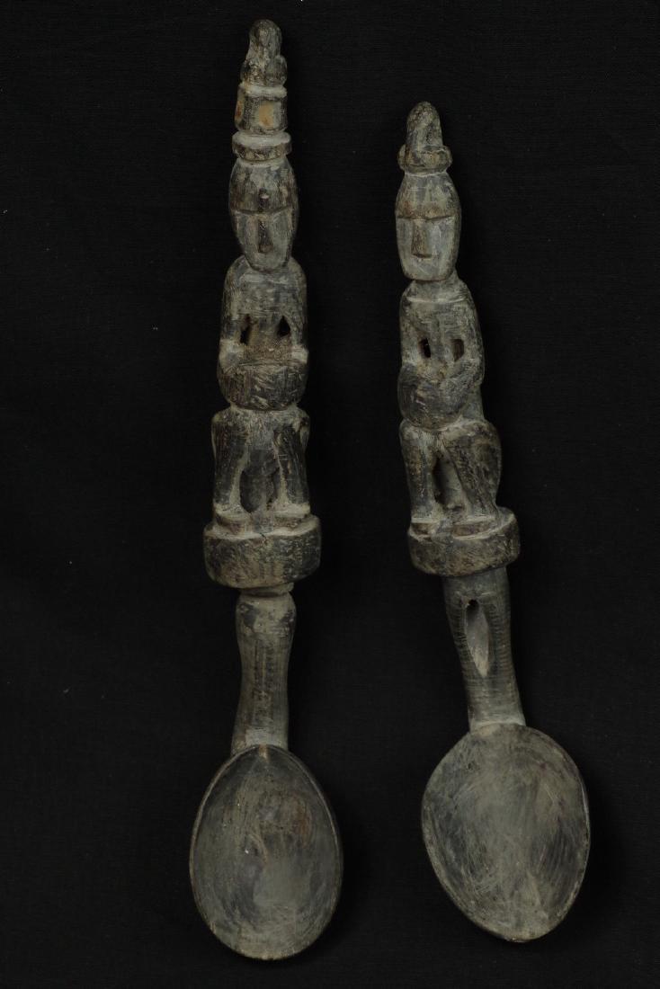 Pair of horn spoons carved as ancestors (1 of 10)