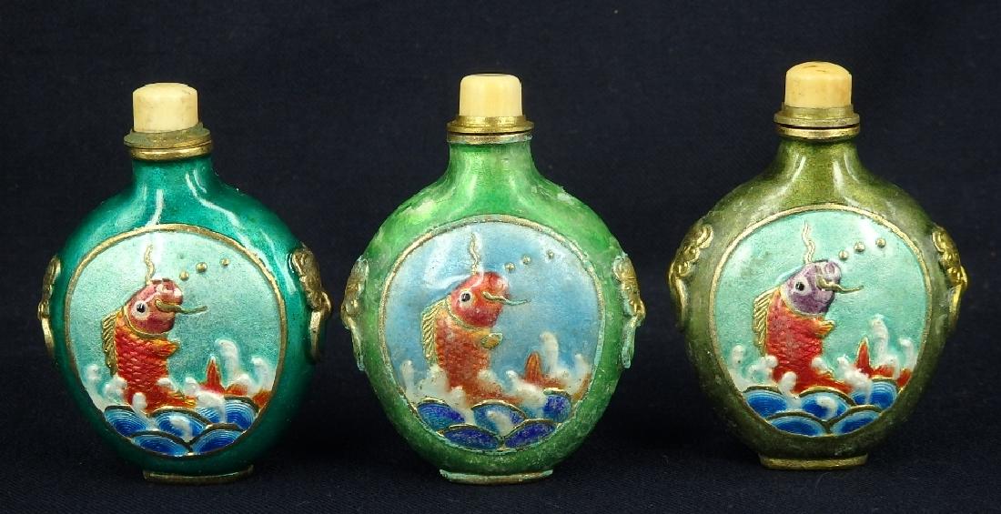 Lot of 3 fish design enamel brass snuff bottles: Item: Lot of 3 fish design enamel brass snuff bottles Origin: China Date/Period: First half 20th century Materials: brass Dimensions: about 2.5" x 3.25"H Lot of 3 fish design enamel brass snuff bottle