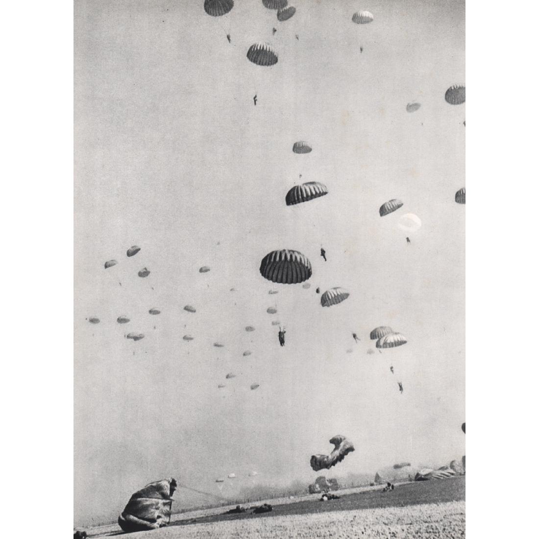 ROBERT CAPA - Parachute Jump, 1945: Artist: ROBERT CAPA Print Title: Parachute Jump on the Rhine, 1945 Medium: Sheet-fed Gravure Printing Date: 1960's Printed in Italy Image Size approx: 9 x 12 inches Robert Capa (1913-1954) was a Hunga