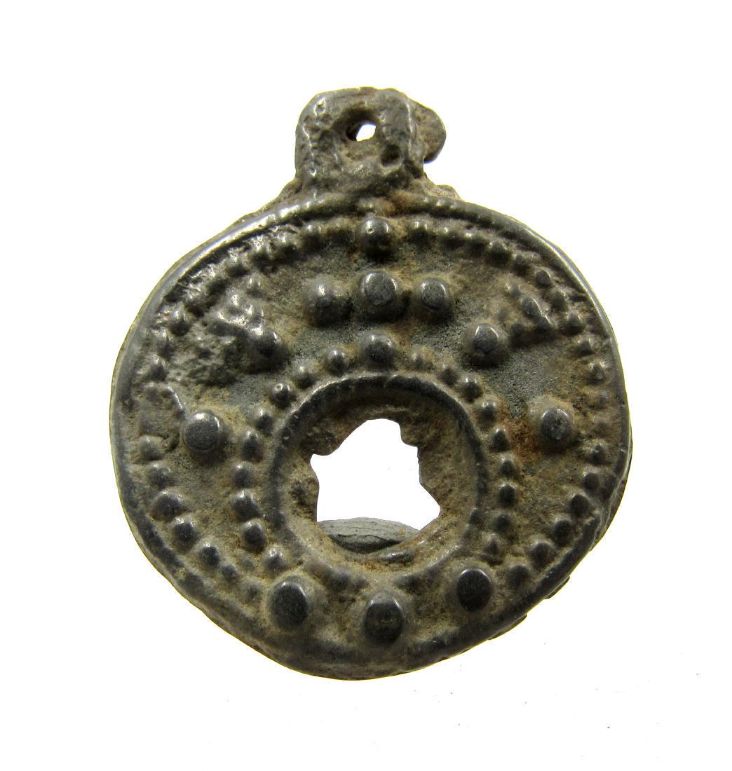 Medieval Viking Era Bronze Lunar Pendant: Medieval Viking Era Bronze Lunar Pendant Date: C. 900 - 1100 A.D. Medieval Viking Era Bronze Lunar Pendant. Professionally cleaned and polished to show original details. This item includes a free gift