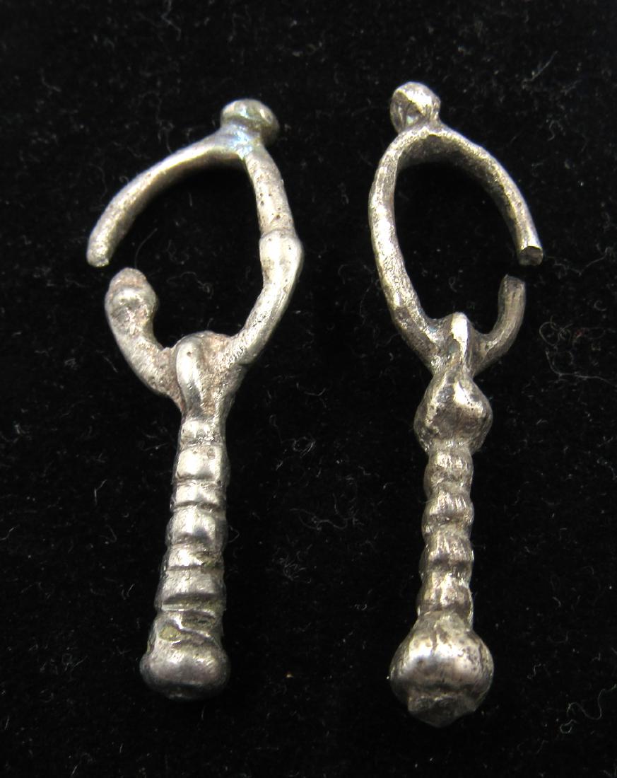 Medieval Viking Era Pair of Silver Earrings: Medieval Viking Era Pair of Silver Earrings Date: Circa 900 – 1100 AD Medieval Viking Era Pair of Silver Earrings. This item has been professionally cleaned to show original details, and includes a 