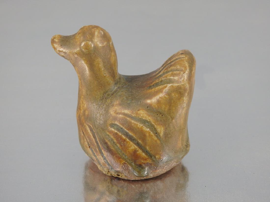 Antique pottery duck offering, Ming dynasty or earlier: Item: Antique pottery duck offering Origin: China Date/Period: Ming dynasty or earlier Materials: pottery Dimensions: about 1.25" x 2" x 2"H Antique pottery duck offering No Reserve: This lot starts a