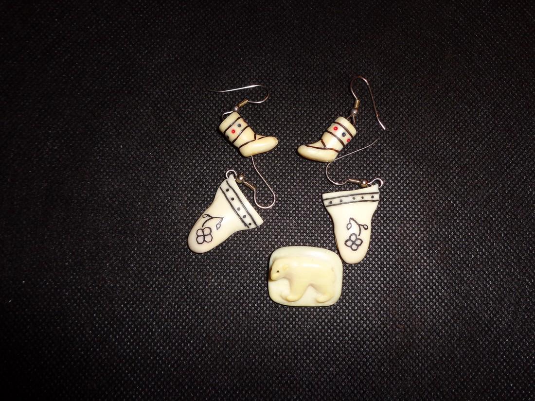 walrus bone sets of earrings , polar bear pin: Title: walrus bone sets of earrings , polar bear pin Date/Period: ca.1960,s Materials: walrus bone Dimensions: 1"all around inuit pair of detailed inuit boots/ pair of ivory mittens / ivory pin by inu