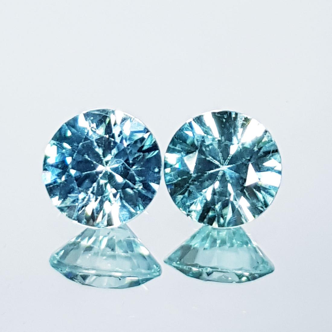 2 Pcs of Natural Zircon - 2.15 ct: Item: 2 Pcs of Natural Zircon - 2.15 ct Color/Clarity: VVS - VS Loose gemstone Carat Weights: 2.15 Size (mm): 6.00 x 6.00 x 3.60 Round - Cambodia No Reserve: This lot starts at $1 and has no reserve a