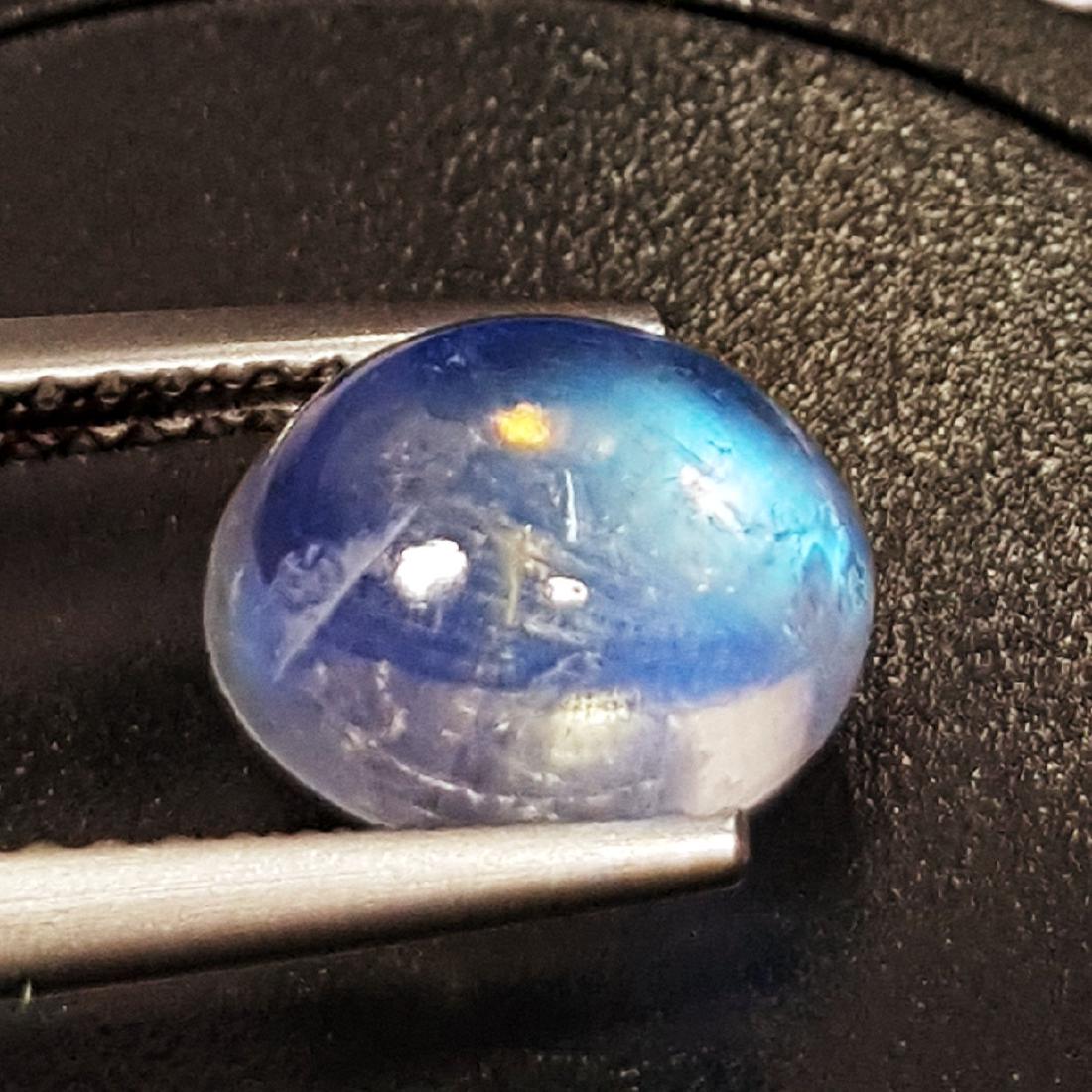 Royal Blue Moonstone - 2.15 ct: Item: Royal Blue Moonstone - 2.15 ct Color/Clarity: VVS Loose gemstone Carat Weights: 2.15 Size (mm): 9.00 x 7.15 x 4.20 Oval - India No Reserve: This lot starts at $1 and has no reserve as a courtesy