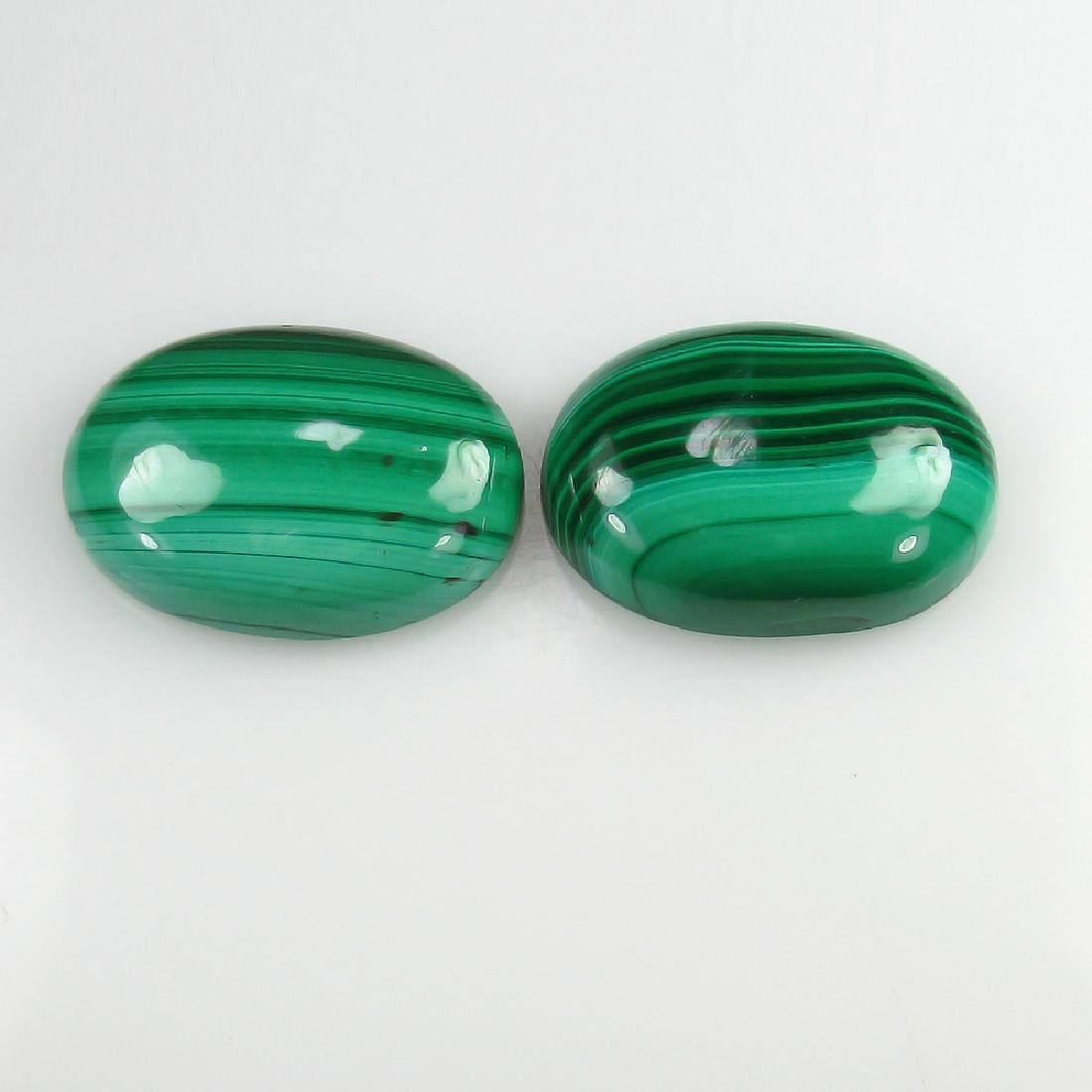 27.30 Ct Genuine Loose Malachite 18X13 mm Oval Matching: Item: 27.30 Ct Genuine Loose Malachite 18X13 mm Oval Matching Pair Stone Clarity: Opaque Gemstones: Malachite Carat Weights: 27.30 Size/Dimensions: 18.00 x 13.00 x 5.20 mm Nice Matching Oval Cabochon