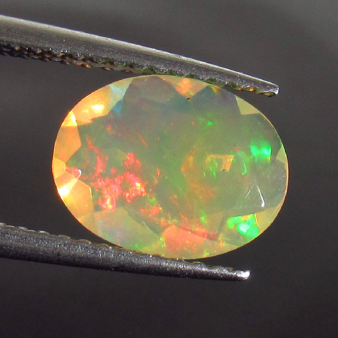 1.22 Ct Genuine Ethiopian Faceted Opal 9.5X7.5 mm Oval (1 of 2)
