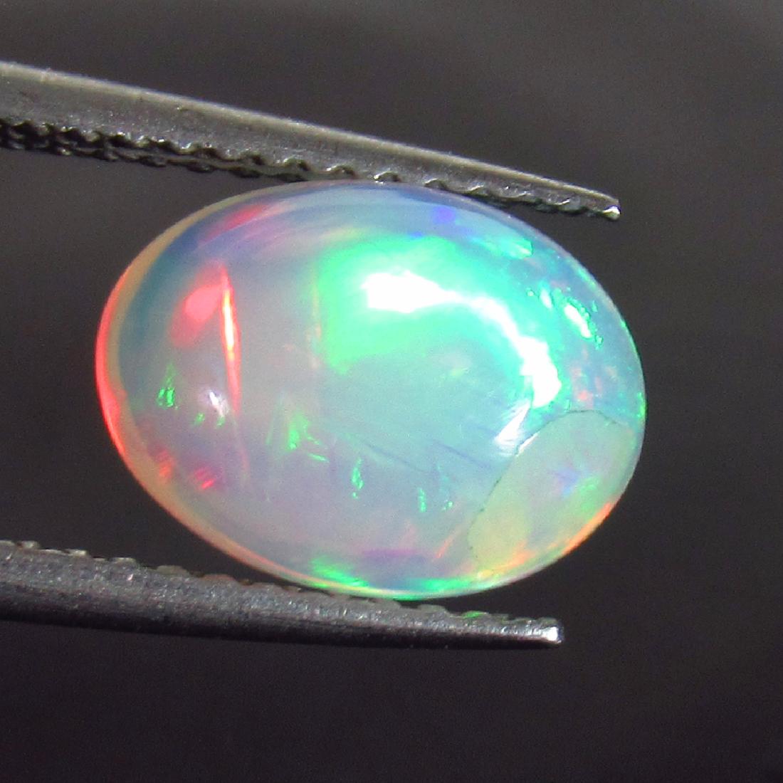 1.65 Ct Genuine Ethiopian Multi-Color Fire White Opal (1 of 2)