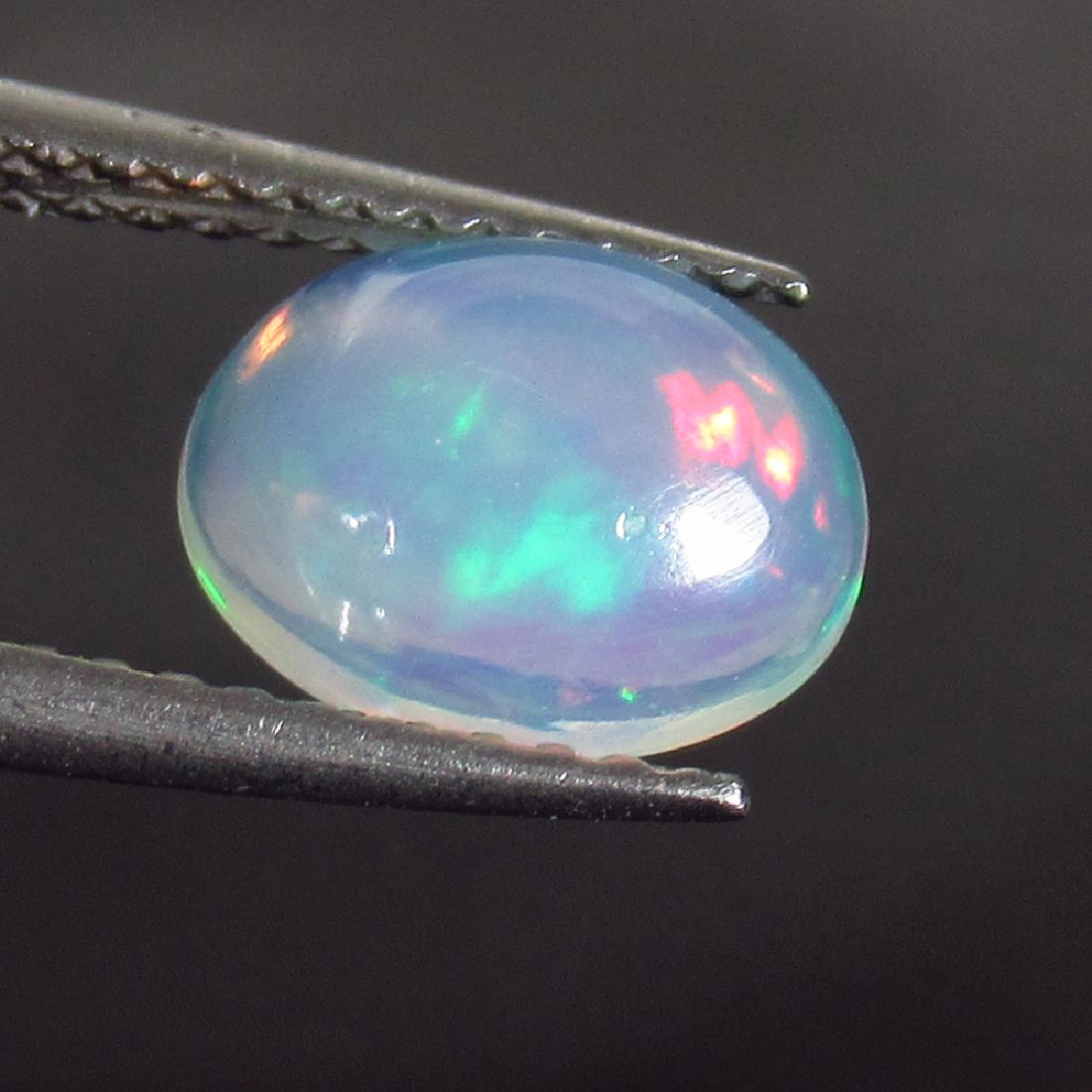 0.97 Ct Genuine Ethiopian Multi-Color Transparent Fire (1 of 2)